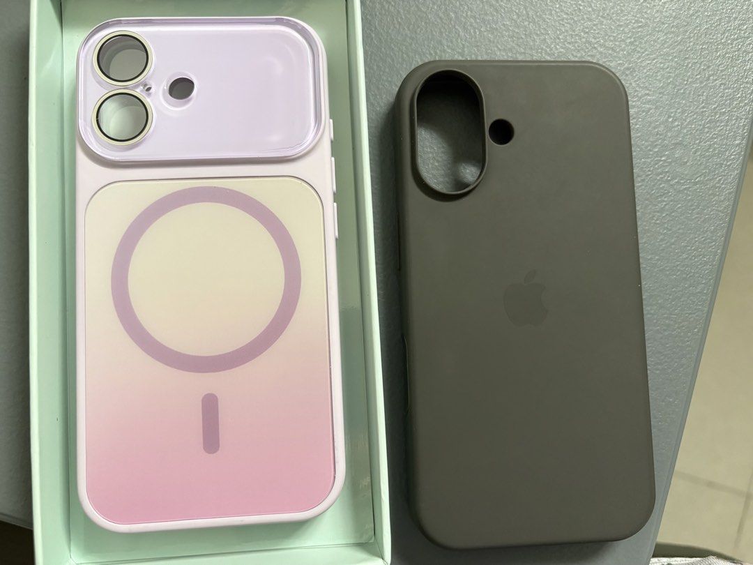 iPhone 16 Cases (Category: Cases & Sleeves) located in Cainta. Submitted by bloomeveryday (Listing ID 1463355253, Image 1). Description: Take both for only ₱300: Silicone case in gray and fashion case in taro (only the latter has cover for the lens and side camera control) Also selling each for 175.