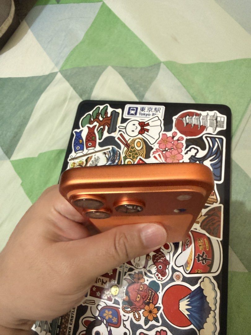 iPhone 17 Pro 512GB Cosmic Orange (Category: iPhone 17 Series) located in Manila. Submitted by cjm00 (Listing ID 1463379777, Image 2). Description: FOR SALE ONLY - iPhone 17 Pro 512GB FU BH 96% - Bought in digital walker feb 2026, still under warranty - Color: Cosmic Orange - Includes original box, receipt, purchased Feb. 2026 - Comes with 5 class a cases - Smooth condition - Meetup locations: Taguig, Makati, Mandaluyong malls - Unli reset upon m