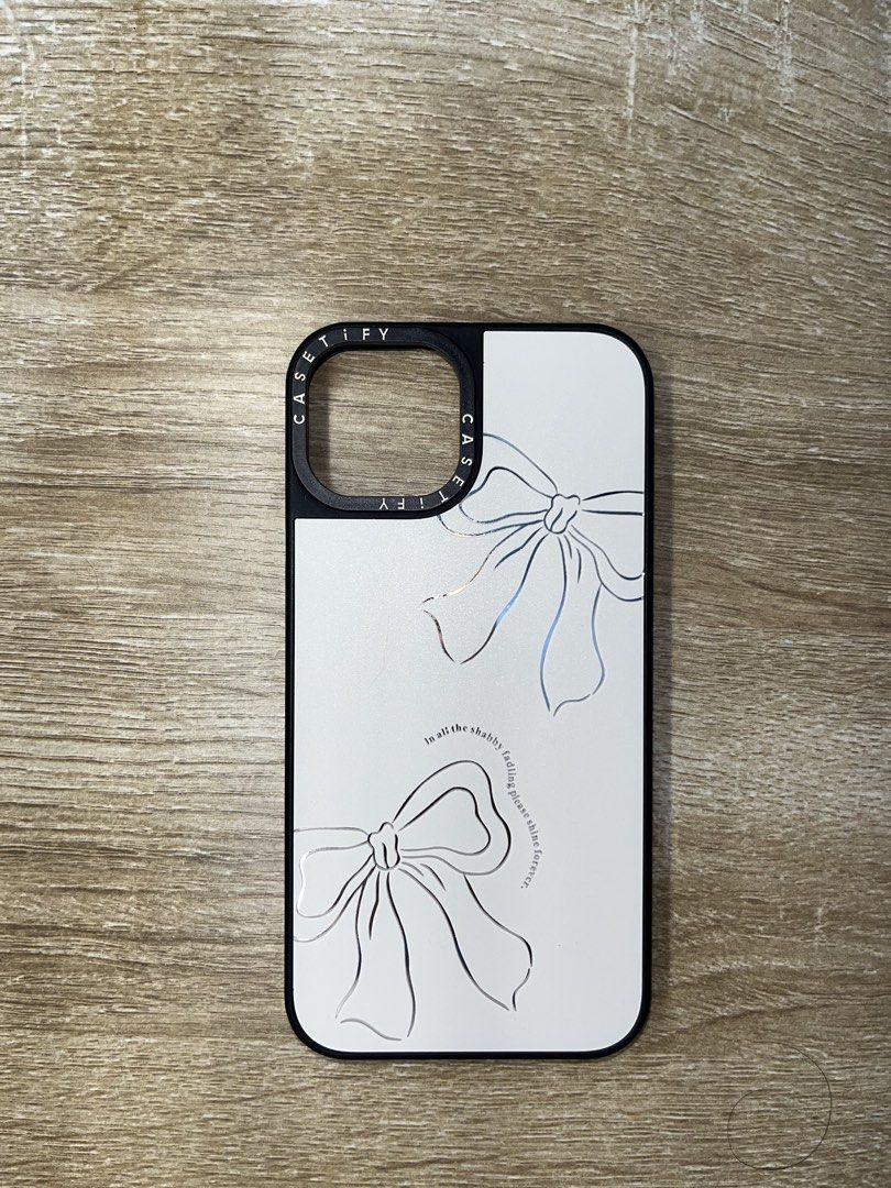 iPhone Cases ASSORTED | iP 13/14 (Category: Cases & Sleeves) located in Manila. Submitted by thvgb (Listing ID 1463498915, Image 3). Description: adrienne lenker pc ! - 120 - few scratches bc of use - back is glossy - orig price: 200 silicone : baby pink and purple - 70 ea - orig price: 99 / 96 pink graffiti pc - 100 - orig price: 150 - back is glossy casetify bow pc - 120 - orig price: 160 casetify black pc - 120 - orig price: 150 colored leopar