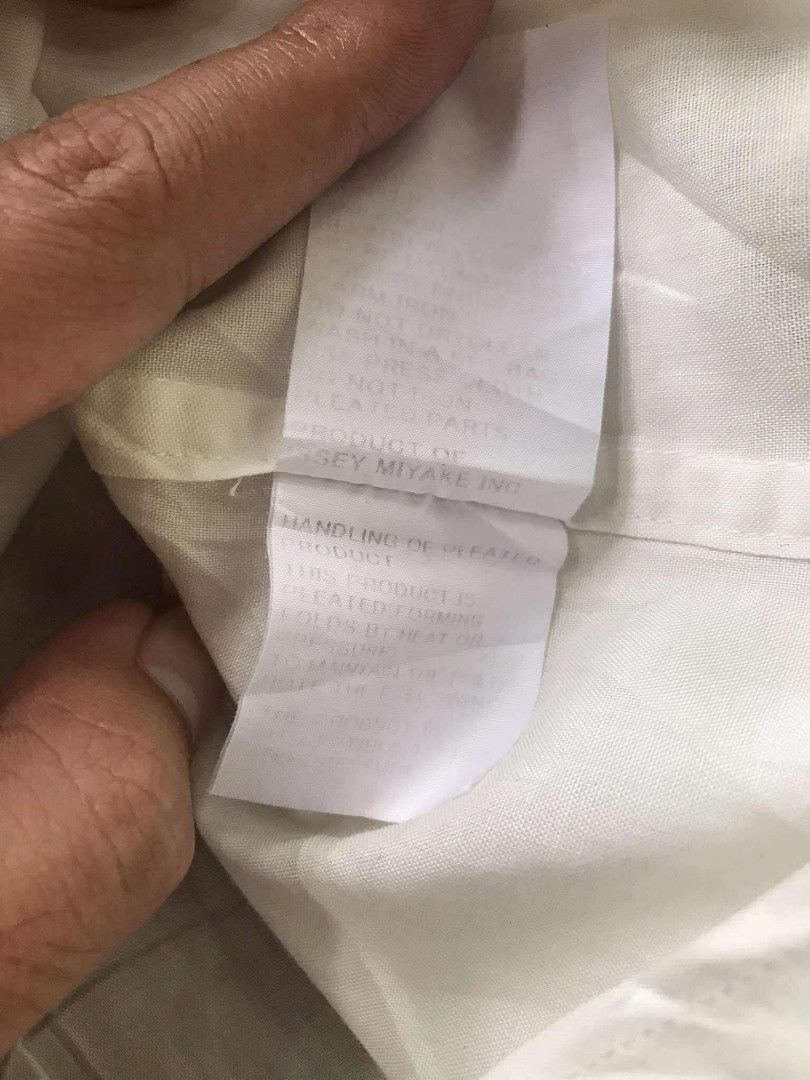 ISSEY MIYAKE MEN 2000's PLEATED WHITE BUTTON DOWN SHIRT (Category: Luxury Apparel) located in Argao. Submitted by thrift_ni_ar (Listing ID 1463462845, Image 3). Description: ISSEY MIYAKE MEN 2000's PLEATED WHITE BUTTON DOWN SHIRT ‼️ AUTHENTIC/LEGIT GOOD CONDITION SIZE LARGE W 21 / L 29 COLORATE 9.8 / 10 ISSUE :SEE LAST PIC 1,800 + SF 🛒🛒.