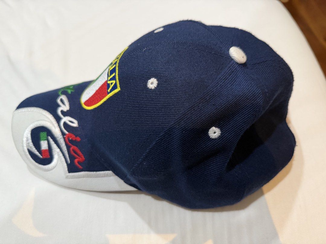 Italia Embroidered Baseball Cap – Navy Blue (Category: Caps & Hats) located in Cebu City. Submitted by mdp_decluttering (Listing ID 1463481203, Image 3). Description: Italia Embroidered Baseball Cap 🇮🇹 Navy blue Italy-themed cap featuring detailed embroidered designs inspired by the Italian flag. Details: • Italia shield embroidery on the front • Green, white & red Italian flag colors • “Italia” embroidered across the brim • White embroidered d