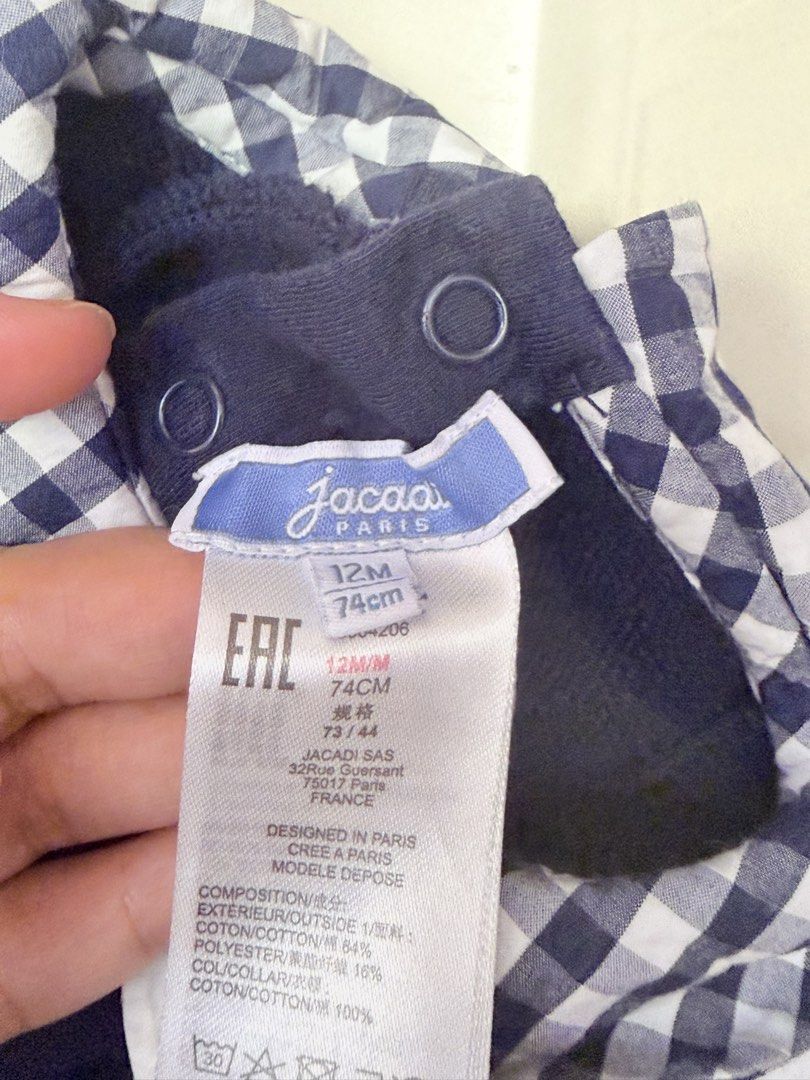 Jacadi Paris Navy Blue Long Sleeve Top with Gingham Collar (Category: Babies & Kids Fashion) located in San Juan, Ilocos Sur. Submitted by bpambid (Listing ID 1463344707, Image 3). Description: - Brand: Jacadi Paris - Color: Navy Blue - Style: Long sleeve top - Features: White and navy gingham Peter Pan collar - Closure: Snaps at the back for easy dressing - Origin: Made in France - Occasion: Great for everyday wear or special occasions.