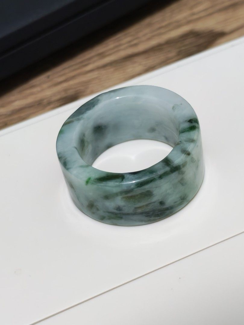 Jade ring (Category: Jewelry) located in Bacoor. Submitted by jadeitemaster (Listing ID 1463520340, Image 3). Description: Size 22mm Diameter Thick, with green floatings. Type A, no certificate. Natural Jadeite. Polished but not perfect hence the price..