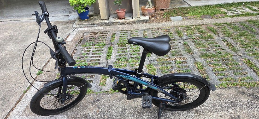 JAVA Folding Bicycle - Blue (Category: Bicycles) located in Singapore. Submitted by luckyfire.5c4312 (Listing ID 1463478037, Image 2). Description: - Blue JAVA folding bike - Front and rear disc brakes - Fenders included - Ideal for city commutes and leisure rides - Easy to fold and store.