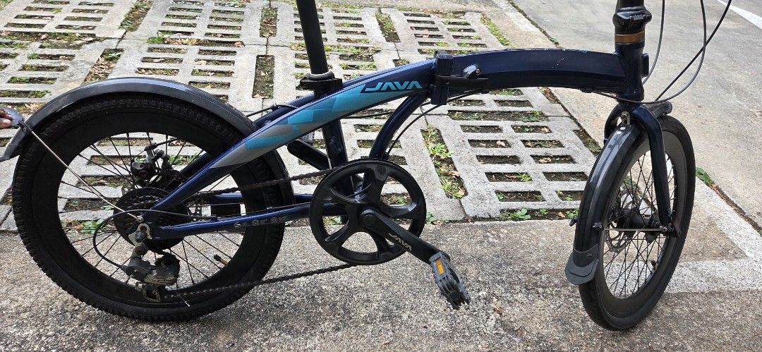 JAVA Folding Bicycle - Blue (Category: Bicycles) located in Singapore. Submitted by luckyfire.5c4312 (Listing ID 1463478037, Image 6). Description: - Blue JAVA folding bike - Front and rear disc brakes - Fenders included - Ideal for city commutes and leisure rides - Easy to fold and store.