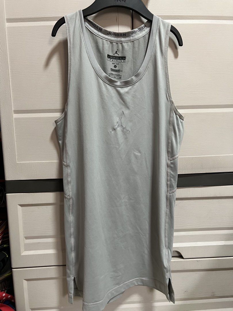 Jordan Dri-Fit Compression Tank Top XL Grey (Category: Activewear) located in Cainta. Submitted by p3spreloved (Listing ID 1463353798, Image 1). Description: - Grey Jordan training tank top - Dri-Fit material with compression fit - Size XL - Jordan logo shows some wear - Ideal for workouts or casual wear - Made in Mexico Length 29in Width 16in VGUC.