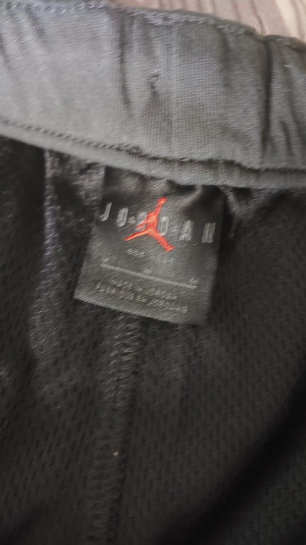 Jordan Flight Club Shorts (Category: Shorts) located in Quezon City. Submitted by santhewpapa (Listing ID 1463384001, Image 2). Description: - Official Member Air Jordan Flight Club design - Grey color - Elastic waistband with drawstring for adjustable fit - Convenient side pockets - Breathable mesh paneling on the back - Iconic Jordan logo on the leg.