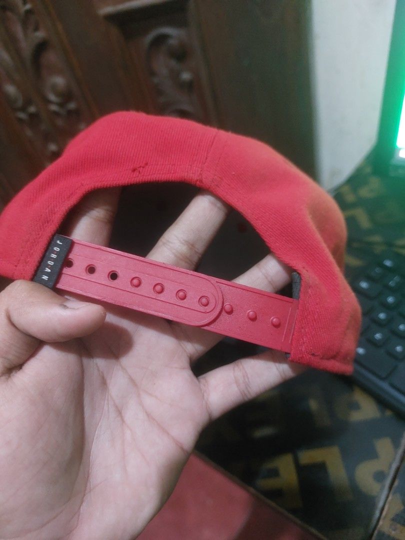 Jordan Snapback Cap Red Black (Category: Caps & Hats) located in Manila. Submitted by mightyturtle_e6e74b (Listing ID 1463394780, Image 3). Description: - Red Jordan snapback cap - Features iconic black Jumpman logo on the front - Adjustable strap for a custom fit - Perfect for any Jordan fan!.