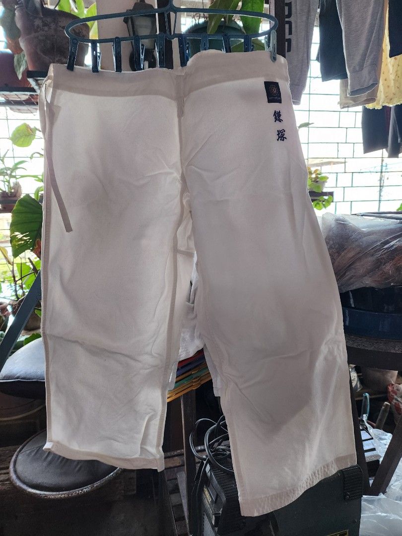 Jui Jutsu Martial Arts Jacket White (Category: Coats, Jackets and Outerwear) located in Meycauayan. Submitted by MP_Shop (Listing ID 1463337202, Image 3). Description: TOP Size: 19W x 30L inches Arm length: 20 inches Bottom: 40w x 33l inches may tali na adjustable Good Condition Color rate: 9/10 issue: need wash Loc: Meycauayan Bulacan Courier: J&T Mop: Gcash.