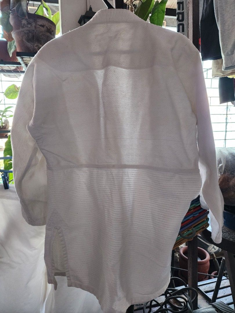Jui Jutsu Martial Arts Jacket White (Category: Coats, Jackets and Outerwear) located in Meycauayan. Submitted by MP_Shop (Listing ID 1463337202, Image 2). Description: TOP Size: 19W x 30L inches Arm length: 20 inches Bottom: 40w x 33l inches may tali na adjustable Good Condition Color rate: 9/10 issue: need wash Loc: Meycauayan Bulacan Courier: J&T Mop: Gcash.