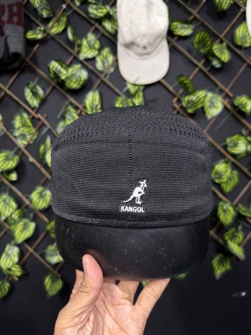 Kangol Black Flat Cap Hat (Category: Caps & Hats) located in Manila. Submitted by raven236 (Listing ID 1463478688, Image 3). Description: - Classic black Kangol flat cap - Features iconic embroidered kangaroo logo on the front - Made with breathable knit material - Adds a stylish touch to any outfit - Great for casual wear.