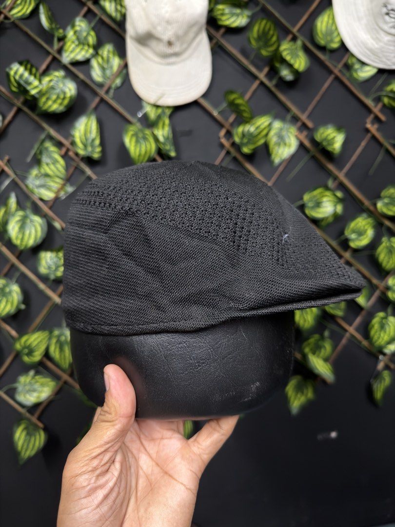 Kangol Black Flat Cap Hat (Category: Caps & Hats) located in Manila. Submitted by raven236 (Listing ID 1463478688, Image 2). Description: - Classic black Kangol flat cap - Features iconic embroidered kangaroo logo on the front - Made with breathable knit material - Adds a stylish touch to any outfit - Great for casual wear.