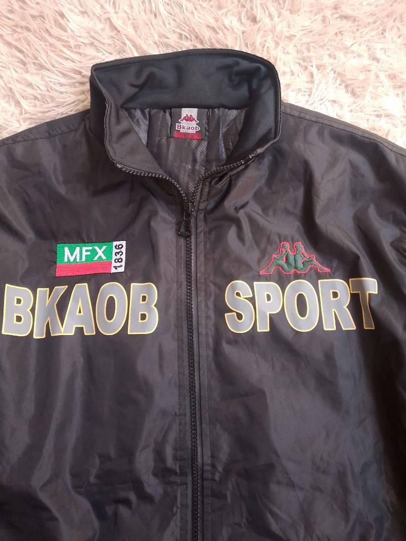 Kappa Sport BKАOB MFX Jacket Black (Category: Coats, Jackets and Outerwear) located in Caloocan City. Submitted by hoodiegeng (Listing ID 1463408830, Image 2). Description: - Black Kappa Sport jacket - Features BKАOB MFX branding on the front - Kappa logo on the sleeves - Zip-up front with a stand-up collar - Ribbed cuffs and hem - Ideal for casual wear or sports activities.