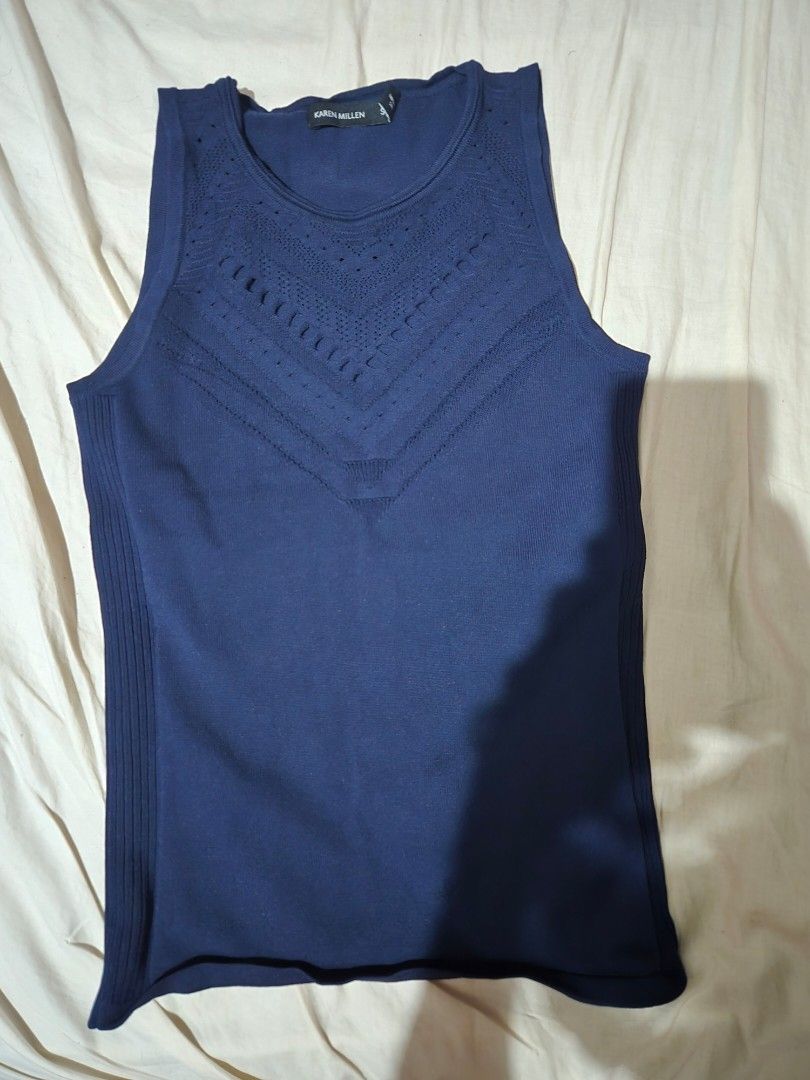 Karen Millen navy knit top (Category: Blouses) located in Manila. Submitted by thewalkingmuse (Listing ID 1463480465, Image 1). Description: no flaws. in excellent condition. size xs - small shipping fee to be shouldered by buyer.