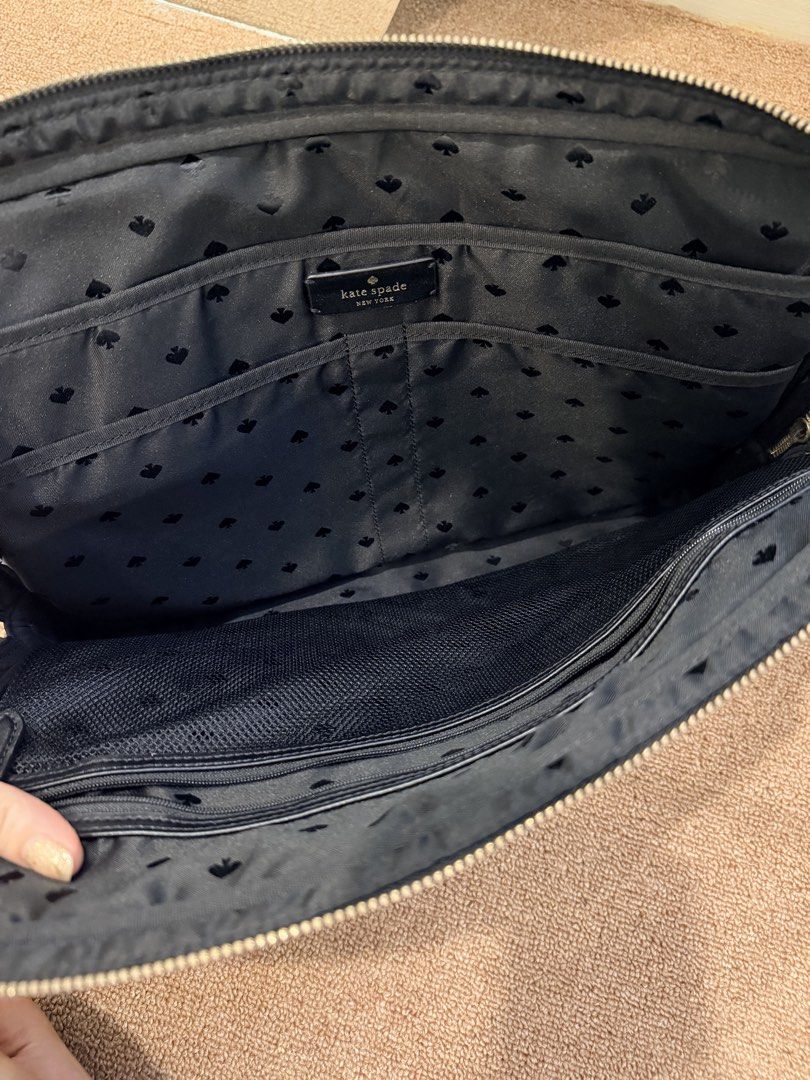 Kate Spade Black Nylon Laptop Bag (Category: Cross-body Bags) located in Quezon City. Submitted by purpleblush (Listing ID 1463343684, Image 3). Description: Kate Spade New York Black Nylon Laptop Bag Classic, sleek, and functional laptop bag in black with silver-tone hardware. Perfect for work, meetings, and travel. * Lightweight and spacious * Secure zip closure * Exterior zippered pocket * Comfortable shoulder straps * Durable nylon material C