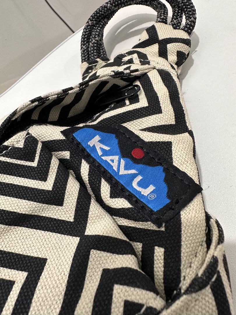 KAVU Rope Sling Bag - Geometric Pattern (Category: Sling Bags) located in Bulacan. Submitted by adoseofluxxee (Listing ID 1463490209, Image 2). Description: - Cool KAVU rope sling bag - Stylish black and cream geometric pattern - Front zippered pocket for essentials - Spacious main compartment - Adjustable strap with buckle for a custom fit - Ideal for everyday adventures or travel.