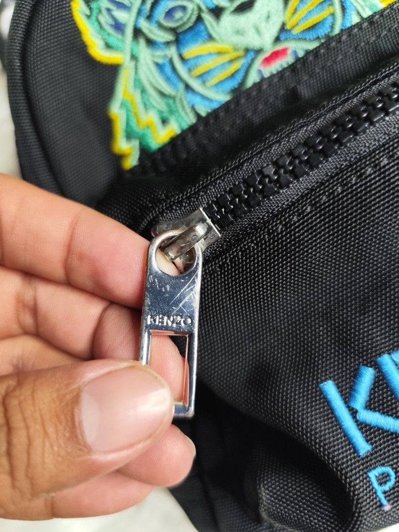 Kenzo Tiger Mini Back Pack (Category: Luxury Bags & Wallets) located in Bansalan. Submitted by thrifttop.ph (Listing ID 1463490140, Image 3). Description: Kenzo Tiger Mini Back Pack ▪️EXCELLENT CONDITION ▪️NO RUBS ▪️NO SCRATCHES - ISSUE MISSING ONE LACE BUT CAN BE USE AS SLING BACK OR BELT BAG 😁.