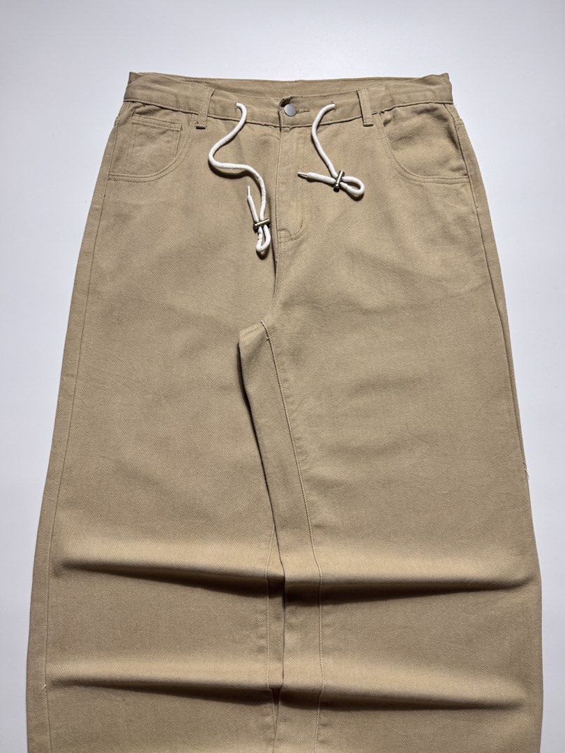 KHAKI BAGGY PANTS (Category: Jeans) located in Cebu City. Submitted by firenzegallery (Listing ID 1463466600, Image 3). Description: •Waist: 30-34 •Thigh: 14 •Length: 41 •Hem: 11 •Condition: 9.5 •Issue(s): none.