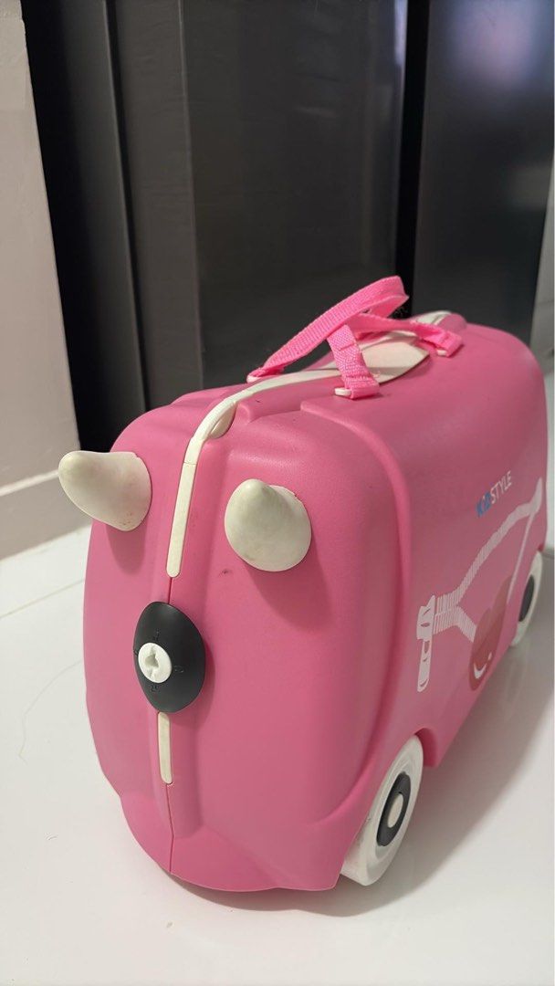 Kidstyle Pink Ride-On Suitcase with Wheels (Category: Luggage) located in Mandaluyong City. Submitted by kacbriz (Listing ID 1463427461, Image 2). Description: - Adorable pink ride-on suitcase for kids - Features a fun lip design and secure straps - Equipped with wheels for easy riding or pulling - Interior straps to keep belongings in place - Ideal for travel, vacations, and sleepovers - Encourages independence by letting kids pack their own ite