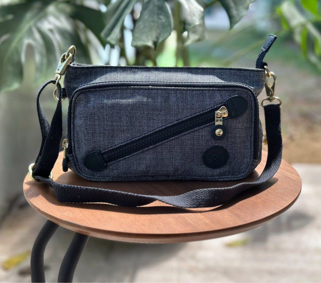 Kipling Milos small shoulder bag (Category: Shoulder Bags) located in Bulacan. Submitted by thriftbagcollections (Listing ID 1463401531, Image 2). Description: This is a Kipling Milos small shoulder bag,featuring a durable fabric construction and a distinctive diagonal front zipper.Excellent condition!Approx;H-6”W-10” strap 14”.