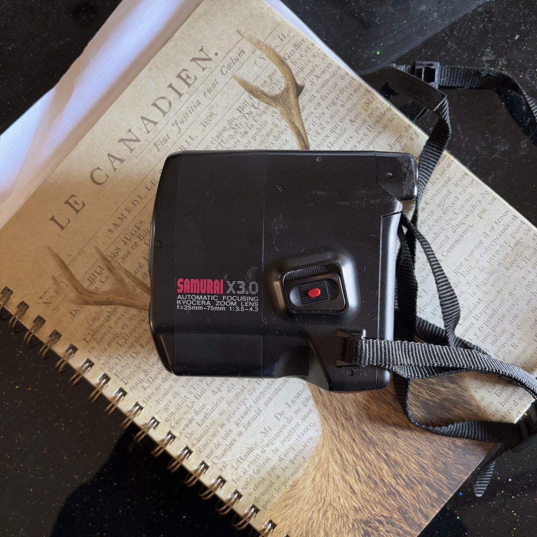 Kyocera Samurai X3.0 Half Frame Film Camera (Category: Cameras) located in Pasig City. Submitted by parall3lles3m (Listing ID 1463365856, Image 3). Description: Kyocera Samurai X3.0 ‼️Rare film camera Battery: 1x 2CR5 Flash working Datestamp working With sample film photos‼️ Shipping from Capitol Commons Pasig City MOP: BDO BPI Gcash Maribank .