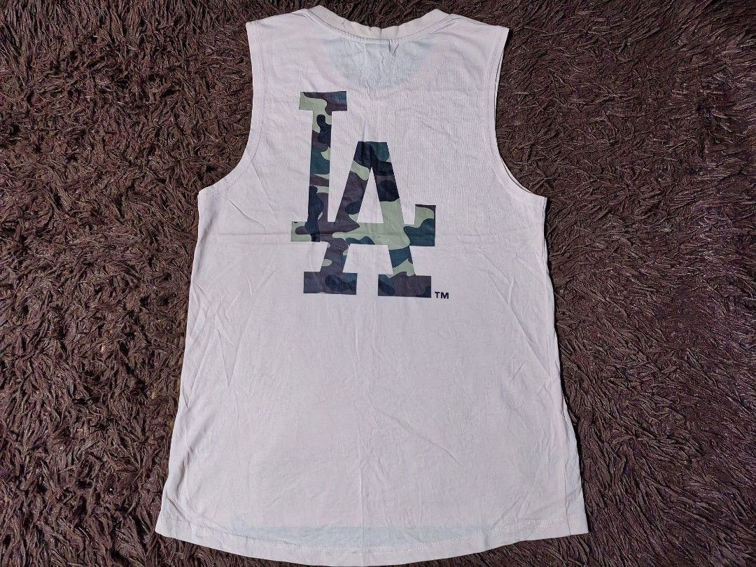 LA Majestic Muscle Tee (Category: Tshirts & Polo Shirts ) located in San Juan City. Submitted by reddvelasquez4298 (Listing ID 1463345923, Image 2). Description: LA Majestic Muscle Tee Size Xs 17.5 Width 26.5 Front Length 28 Back Length Like New Condition 480 pesos PM.