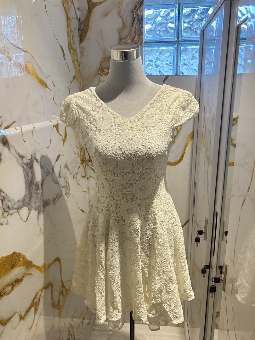 LACE SHORT SLEEVES DRESS (Category: Dresses) located in Cavite. Submitted by keykssells (Listing ID 1463482466, Image 1). Description: white short sleeve lace layer dress (large) - can fit medium to large.