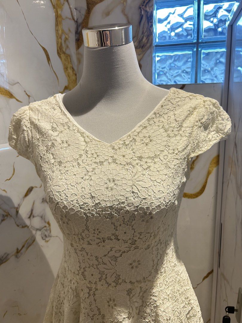 LACE SHORT SLEEVES DRESS (Category: Dresses) located in Cavite. Submitted by keykssells (Listing ID 1463482466, Image 2). Description: white short sleeve lace layer dress (large) - can fit medium to large.