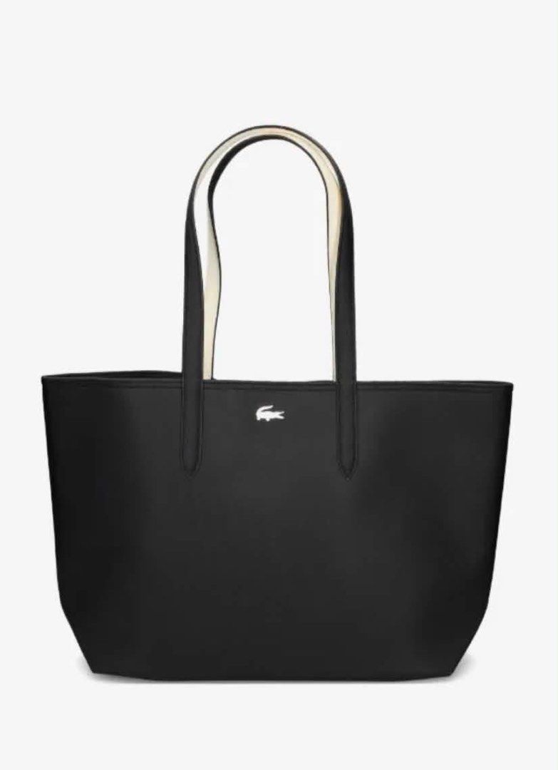 Lacoste Black Tote Bag with White Handles (Category: Tote Bags) located in Trece Martires City. Submitted by chelriou (Listing ID 1463479251, Image 3). Description: - Classic black tote bag from Lacoste - Features white contrast handles - Spacious interior, ideal for everyday use - Simple and chic design - Iconic Lacoste crocodile logo subtly placed on the front 🔥 PROMO! PROMO! PROMO! 🔥 👜 LACOSTE NEW ARRIVALS 👜 ✨ 100% ORIGINAL — Imported from