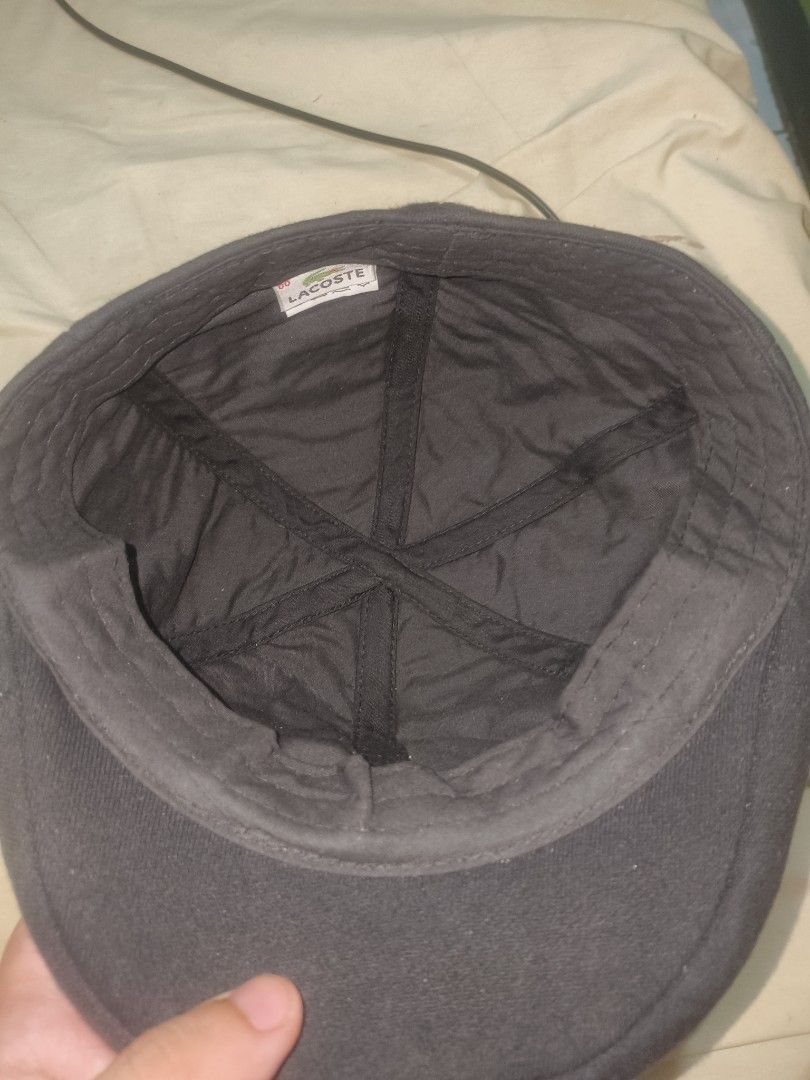 Lacoste Flat Hat (Category: Caps & Hats) located in Valenzuela. Submitted by rainshia0792039 (Listing ID 1463448567, Image 2). Description: - Authentic Lacoste black cap - Features the iconic crocodile logo on the side - Classic flat cap design - Ideal for daily use.