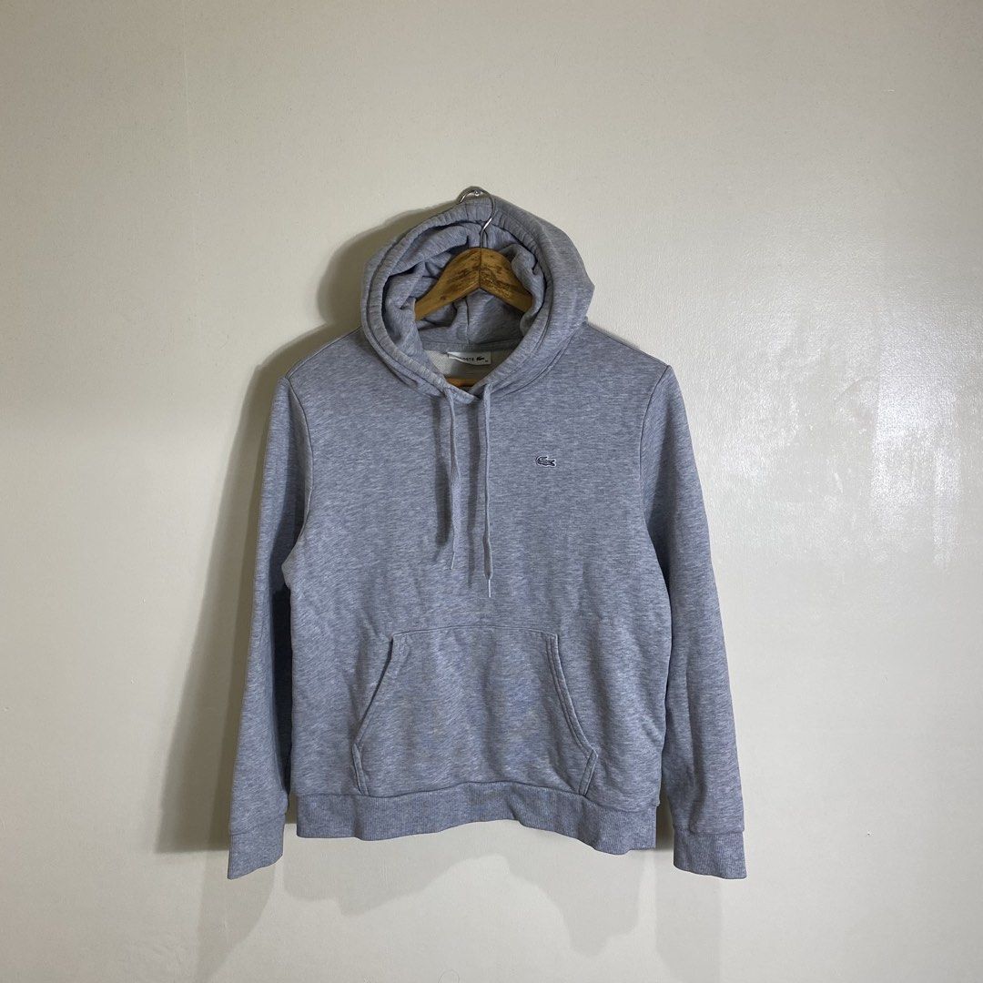 Lacoste Grey Hoodie Size 36 (Category: Coats, Jackets and Outerwear) located in Manila. Submitted by carbertjakosalem (Listing ID 1463364017, Image 1). Description: - Grey Lacoste hoodie - Features the classic crocodile logo on the chest - Made from comfortable cotton - Size 36 - Ideal for casual and everyday wear.