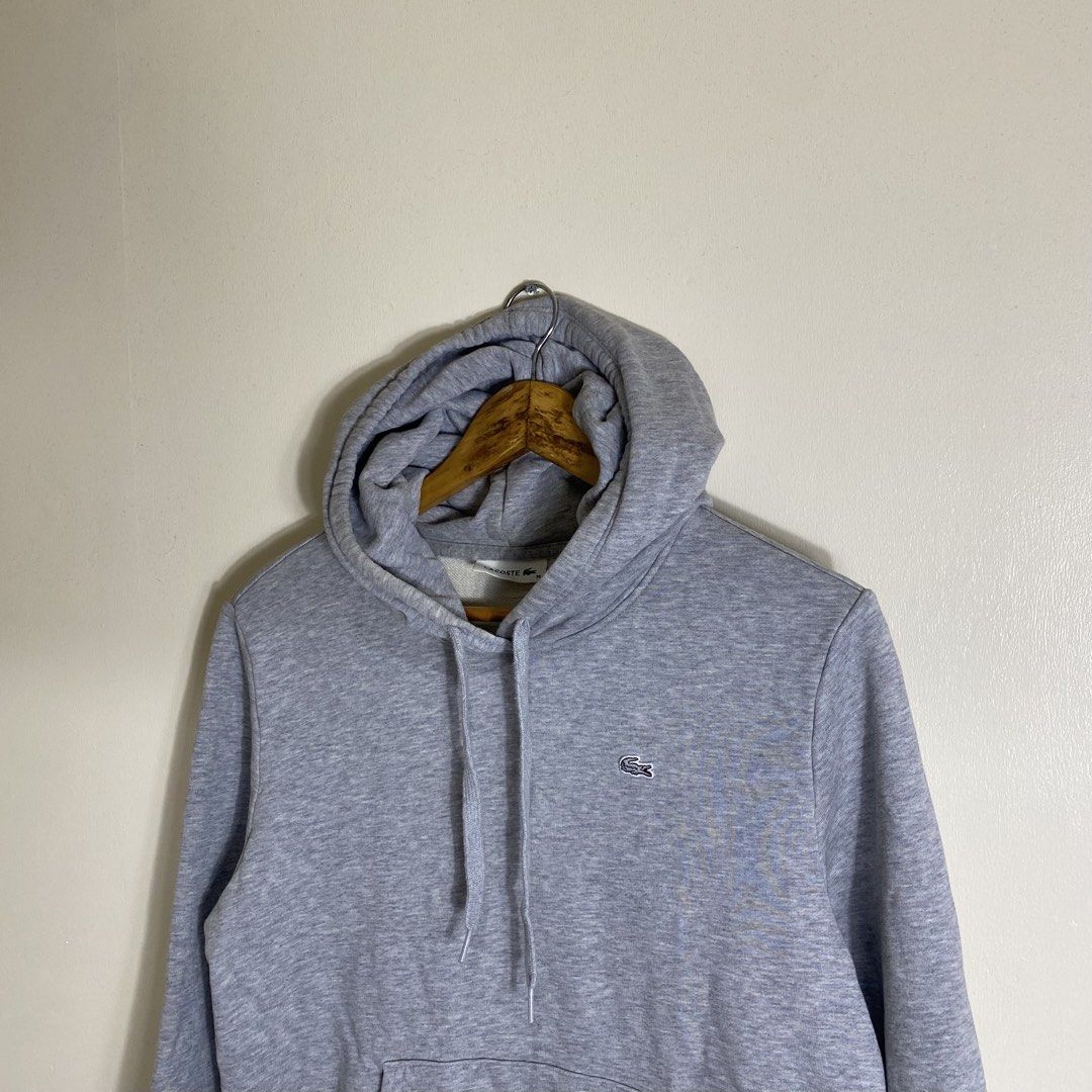 Lacoste Grey Hoodie Size 36 (Category: Coats, Jackets and Outerwear) located in Manila. Submitted by carbertjakosalem (Listing ID 1463364017, Image 2). Description: - Grey Lacoste hoodie - Features the classic crocodile logo on the chest - Made from comfortable cotton - Size 36 - Ideal for casual and everyday wear.