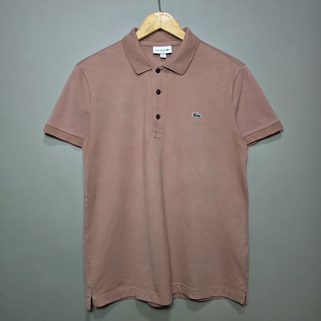 Lacoste Mocha Polo Shirt (Category: Tshirts & Polo Shirts ) located in Quezon City. Submitted by somewearinmnl (Listing ID 1463527156, Image 1). Description: Lacoste Mocha Polo Shirt - Size: 5/Large (Slim Fit) Fits Medium - Dimension: 20 W" x 27 L" - Excellent Condition - Color rate: 9.8/10 - No Issues - Color may vary due to lighting 📸.