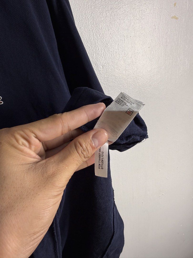 Lacoste navy blue men polo shirt (Category: Tshirts & Polo Shirts ) located in Daraga. Submitted by mirandillaadrian (Listing ID 1463467524, Image 3). Description: Authentic 9/10 Minimal sign of used sa collar Very presentable Yung body part niya is pasok sa like new color rate 22x30 Xl.