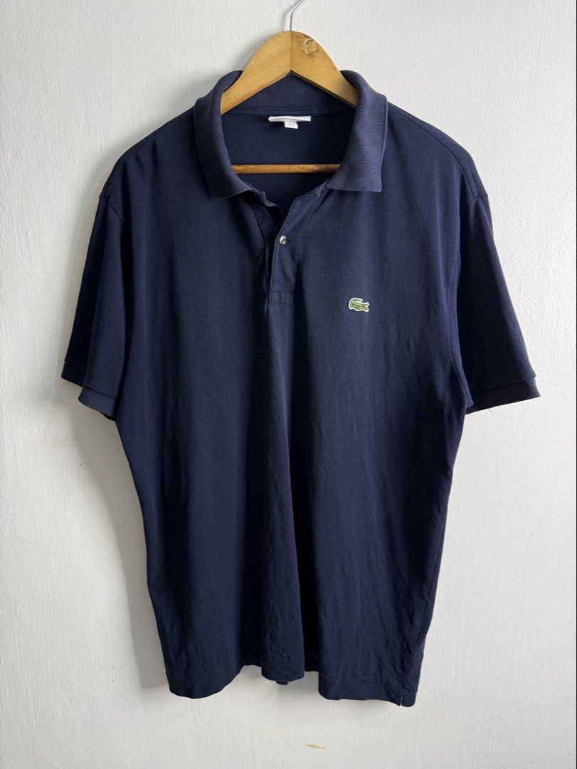 Lacoste navy blue men polo shirt (Category: Tshirts & Polo Shirts ) located in Daraga. Submitted by mirandillaadrian (Listing ID 1463467524, Image 1). Description: Authentic 9/10 Minimal sign of used sa collar Very presentable Yung body part niya is pasok sa like new color rate 22x30 Xl.
