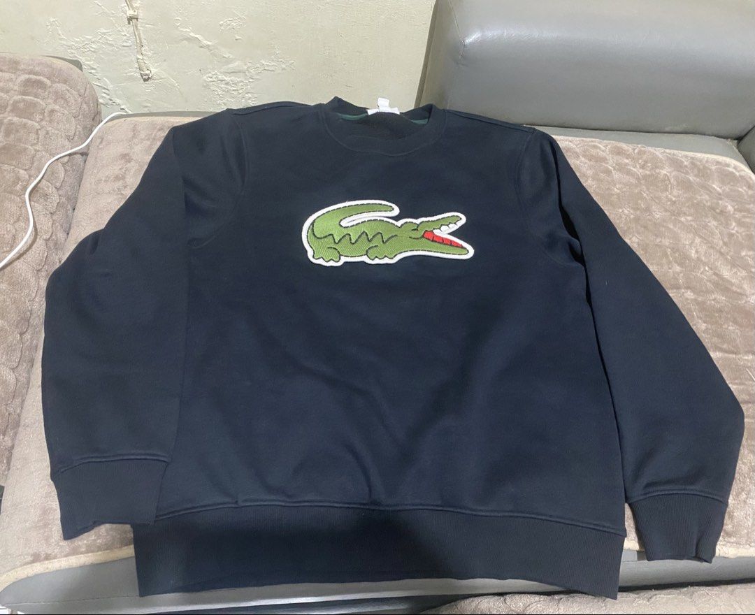 Lacoste sweatshirt big logo (Category: Announcements) located in Manila. Submitted by ventabols (Listing ID 1463410999, Image 1). Description: Almost new big logo lacoste sweatshirt Xl on tag best fit on large Black .