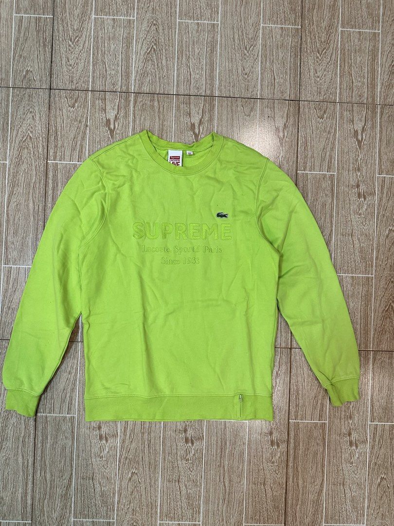 Lacoste x supreme crewneck (Category: Coats, Jackets and Outerwear) located in Taytay. Submitted by rthriftshoppp (Listing ID 1463478012, Image 1). Description: - Brand: Lacoste x Supreme - Type: Crewneck Sweater - Color: Vibrant Lime Green - Size: S (EU 48 / UK 38 / US 38) - Condition:9/10 - Features: Iconic Supreme branding with Lacoste Sport Paris and Since 1933 details, embroidered Lacoste crocodile logo. - Style: Perfect for streetwear enthu
