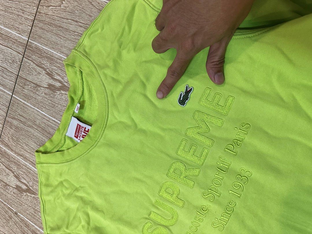 Lacoste x supreme crewneck (Category: Coats, Jackets and Outerwear) located in Taytay. Submitted by rthriftshoppp (Listing ID 1463478012, Image 3). Description: - Brand: Lacoste x Supreme - Type: Crewneck Sweater - Color: Vibrant Lime Green - Size: S (EU 48 / UK 38 / US 38) - Condition:9/10 - Features: Iconic Supreme branding with Lacoste Sport Paris and Since 1933 details, embroidered Lacoste crocodile logo. - Style: Perfect for streetwear enthu