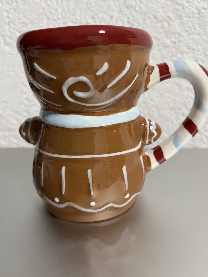 Lady Gingerbread Mug with Candy Cane Handle (Category: Coffee & Tea Tableware) located in Mandaue City. Submitted by allthingzdopamine (Listing ID 1463373985, Image 2). Description: -Adorable lady gingerbread design -bought from Flying Tiger Ayala Bloc Cebu - Fun candy cane striped handle - Ideal for morning coffee or hot chocolate - Perfect for the holiday season - has minimal crazing and manuf on the inside, please see photos.