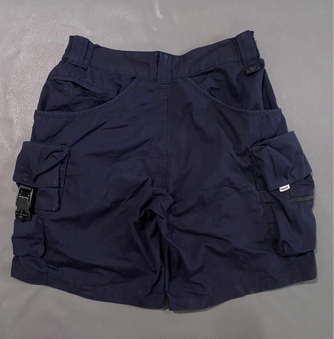 LAKH Navy Cargo Shorts Size L (Category: Shorts) located in Pozorrubio. Submitted by izaykite2g (Listing ID 1463383905, Image 2). Description: - Navy blue LAKH cargo shorts - Size: Large (L) - 34 up to 36 actual waistline - 21.5 inches length - 14 inches leg opening - Features multiple pockets - Secure zip and buckle closures - Comfortable elasticated waistband - Ideal for everyday wear and outdoor activities.