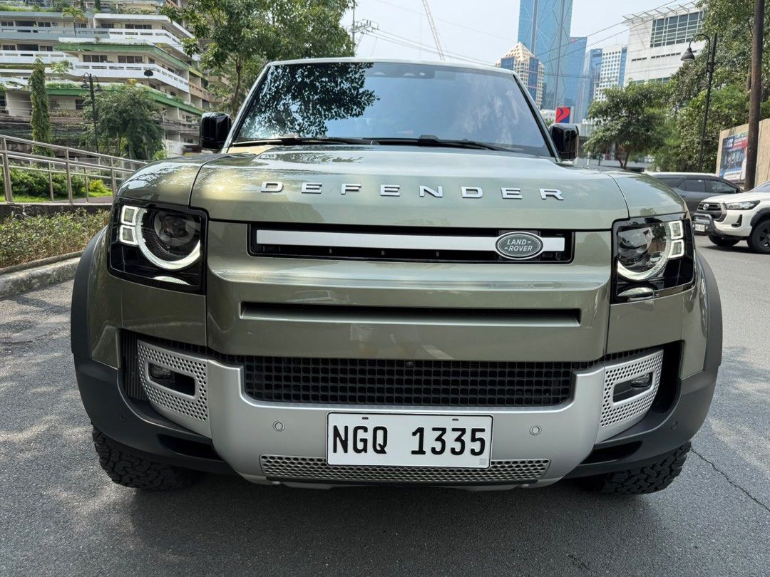 Land Rover Defender D90 2022 jackani Auto (Category: Used Cars) located in Pasig City. Submitted by jackani (Listing ID 1463402492, Image 2). Description: 2022 Land Rover Defender D240 Diesel 9,000 km only Casa Maintained orig white roof Steelies OEM Wheels BF Goodrich Tires DRL video rear mirror option Fender Flare Claddings Classic Mudflaps Stepboard Pangea Green Original Paint Full PPF V Kool Tint Full Casa Warranty U can call 09173295586.