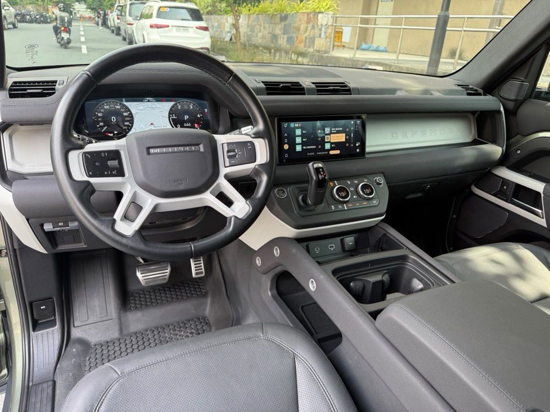 Land Rover Defender D90 2022 jackani Auto (Category: Used Cars) located in Pasig City. Submitted by jackani (Listing ID 1463402492, Image 3). Description: 2022 Land Rover Defender D240 Diesel 9,000 km only Casa Maintained orig white roof Steelies OEM Wheels BF Goodrich Tires DRL video rear mirror option Fender Flare Claddings Classic Mudflaps Stepboard Pangea Green Original Paint Full PPF V Kool Tint Full Casa Warranty U can call 09173295586.