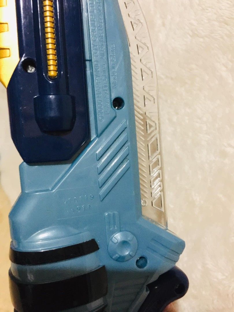 LASERTECH 2-in-1 transforming toy (Category: Action & Battle Toys) located in Baguio. Submitted by izza_thrifty (Listing ID 1463472963, Image 3). Description: - Cool toy gun with retractable blade - Striking blue and gold color scheme - Made by Happy Kid Toy Group - Ideal for imaginative play and adventures - Shows minor scuffs from normal play (please check photos for condition).