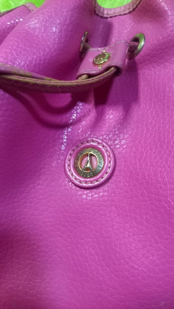 Latour Eitfeel Pink Leather Drawstring Bucket Bag (Category: Luxury Bags & Wallets) located in Manila. Submitted by twinklelyn03 (Listing ID 1463387711, Image 2). Description: - pink leather bucket bag - Secure drawstring closure - Adjustable strap for comfortable wear - Interior features a zip pocket and a slip pocket - Minor marks present inside the bag - Ideal for everyday use see photos for details pm sa sure buyer only thank you so much po!.