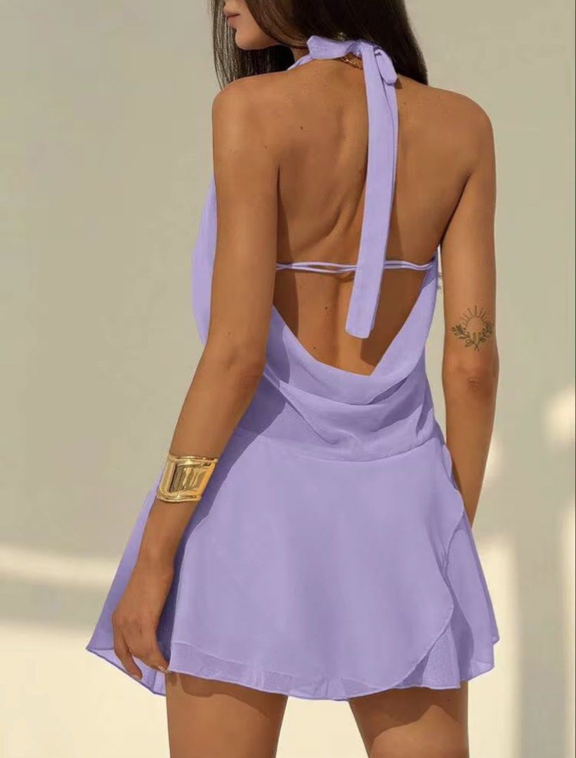 Lavender Halter Neck Drape Mini Dress (Category: Dresses) located in Villasis. Submitted by juliaxgamboa (Listing ID 1463515642, Image 3). Description: - Adorable lavender mini dress - Halter neck with a flattering low V-neckline - Elegant draping detail at the front - Chic open back with adjustable tie closure - Flowy hemline for a graceful look - Ideal for parties, dates, or a night out.