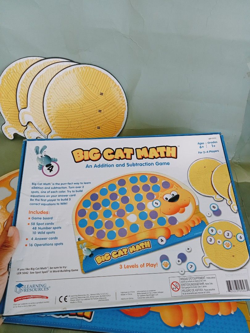 Learning Resources Big Cat Math Addition Subtraction Game (Category: Educational & Learning Toys) located in Rosario. Submitted by elysedeclutter (Listing ID 1463379656, Image 3). Description: - Fun addition and subtraction game for kids. - Learn math with Big Cat Math! - Includes: game board, 20 spot cards, 10 wild cards, 16 operations spots. - Great for 2-4 players. - Recommended for ages 6+. - Helps build equations and practice math skills. -1