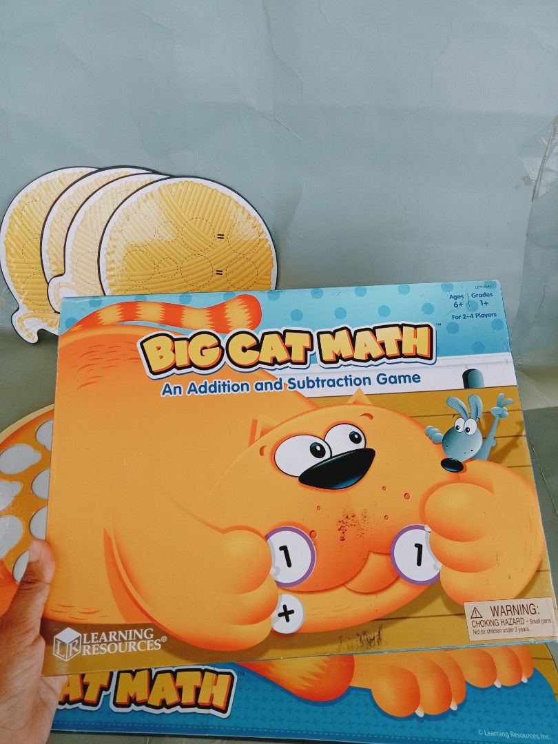 Learning Resources Big Cat Math Addition Subtraction Game (Category: Educational & Learning Toys) located in Rosario. Submitted by elysedeclutter (Listing ID 1463379656, Image 2). Description: - Fun addition and subtraction game for kids. - Learn math with Big Cat Math! - Includes: game board, 20 spot cards, 10 wild cards, 16 operations spots. - Great for 2-4 players. - Recommended for ages 6+. - Helps build equations and practice math skills. -1