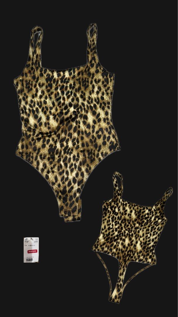 Leopard Print Bodysuit (Category: Others Tops) located in Manila. Submitted by nellafelix1720 (Listing ID 1463473149, Image 1). Description: - Fierce leopard print bodysuit - Chic square neckline with delicate thin straps - Comfortable thong bottom - Versatile for layering or as a standalone piece - Brand new with original tag attached.