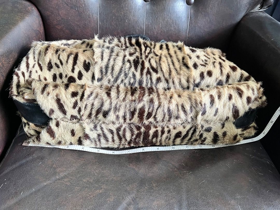 Leopard Print Fur & Leather Shoulder Bag (Category: Shoulder Bags) located in Makati City. Submitted by Ina_Ndang (Listing ID 1463335811, Image 3). Description: Leopard print hobo style/ hand/ shoulder bag Faux fur but genuine cowhide Brand is Escada 90s era This bag has been with me for years Used few times only Statement piece esp for fashionista Already outgrown that era With gold plated rivets/ring holders Has 3 pockets inside (2 open, 1 zipp