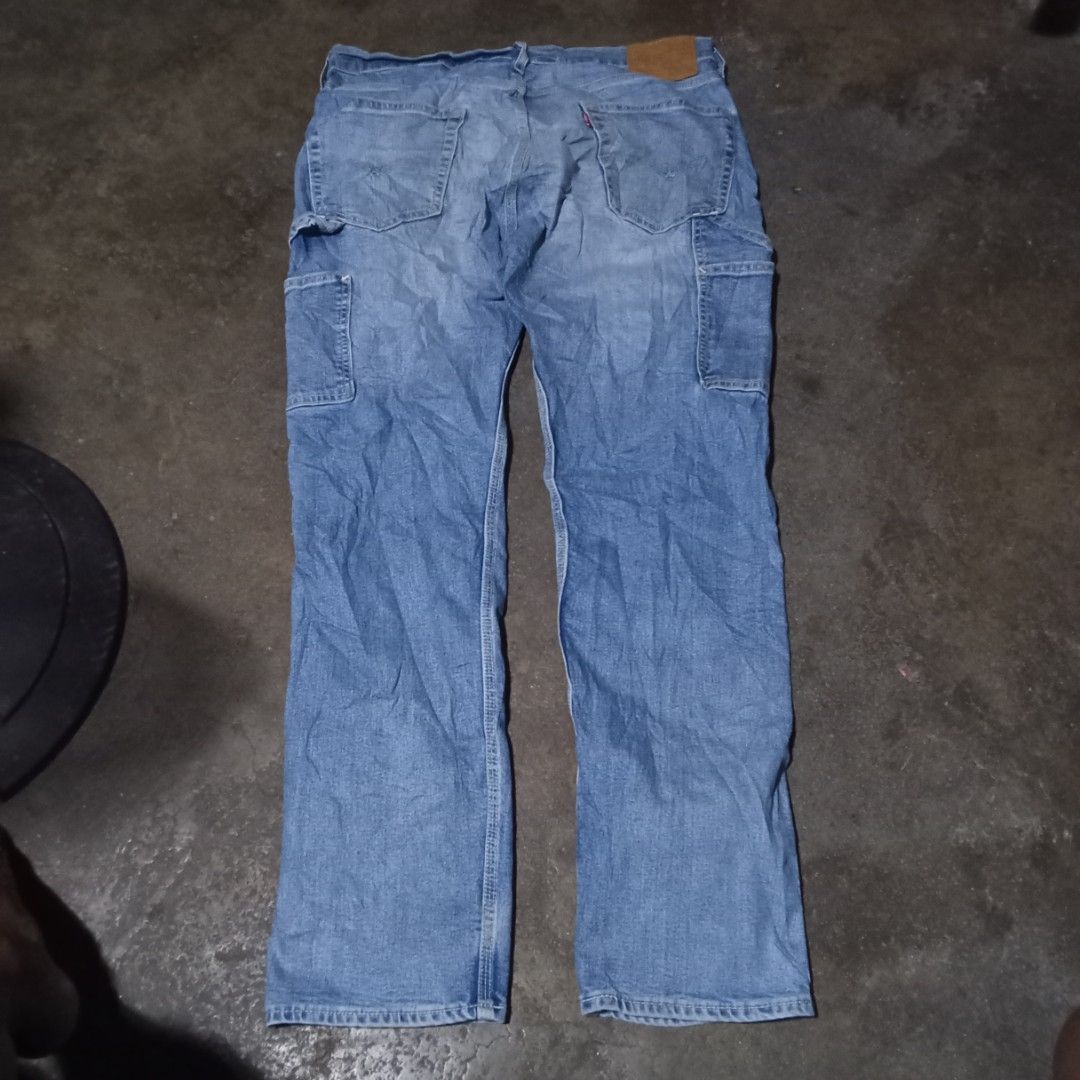 Levi's premium 502 carpenter pants (Category: Jeans) located in Manila. Submitted by tcbukay_zxc25 (Listing ID 1463447663, Image 1). Description: Levi's premium 502 carpenter pants waistline 34-35 length 41 leg opening 7 excellent no issue.